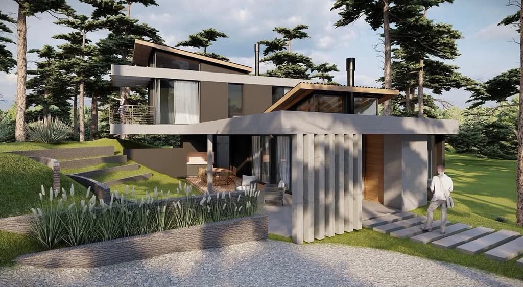 The same residence in daylight, a second elevation showing the same cantilevered upper floor from another angle.